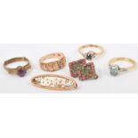 Dress ring, another, Mitzpah ring, two brooches and a three stone ring,