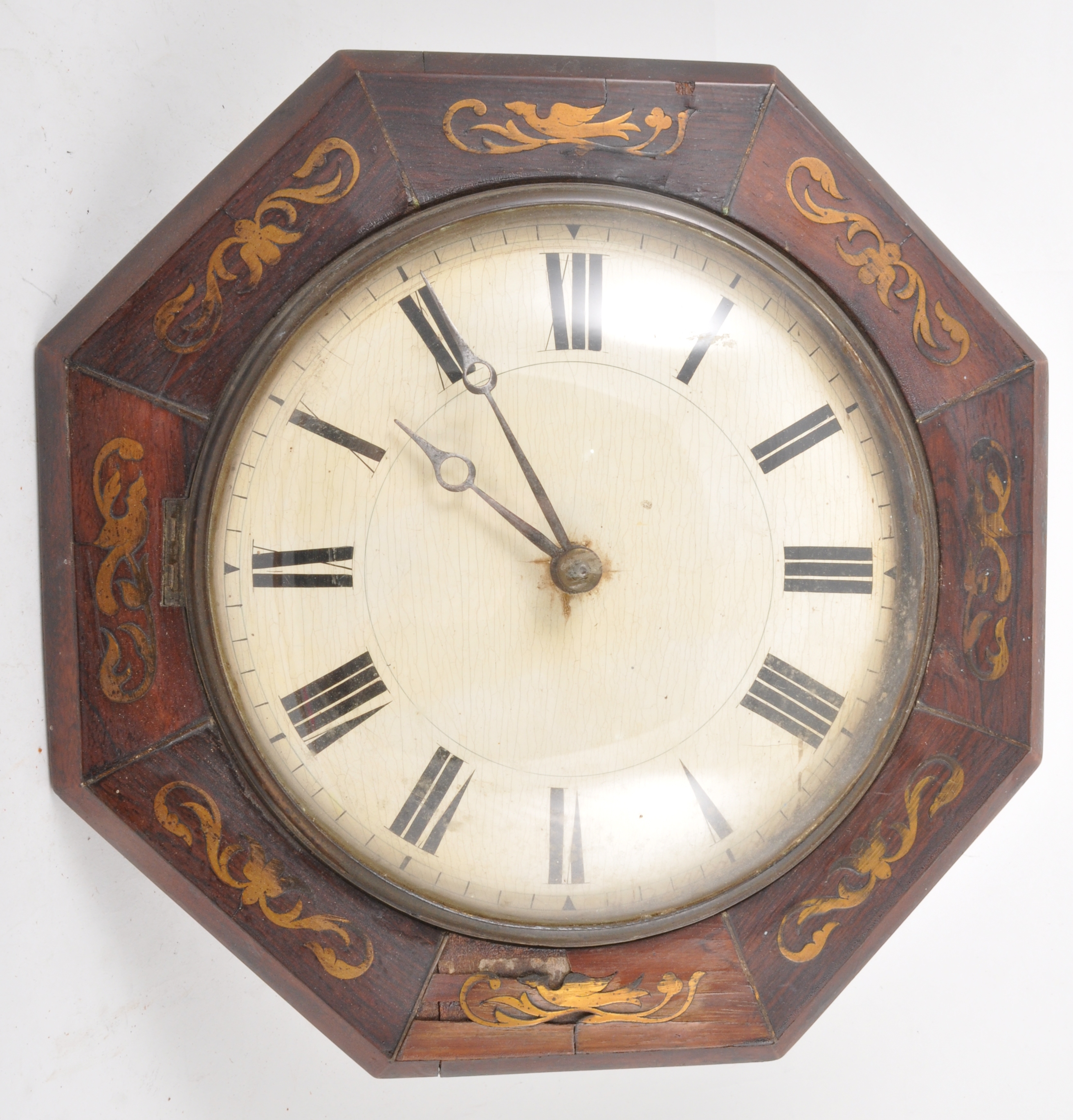 Octagon wall clock, inlaid surround, with weights, no pendulum (possibly American), 33cm.