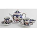 First period Worcester style teapot, 13cm, two cups and saucers,