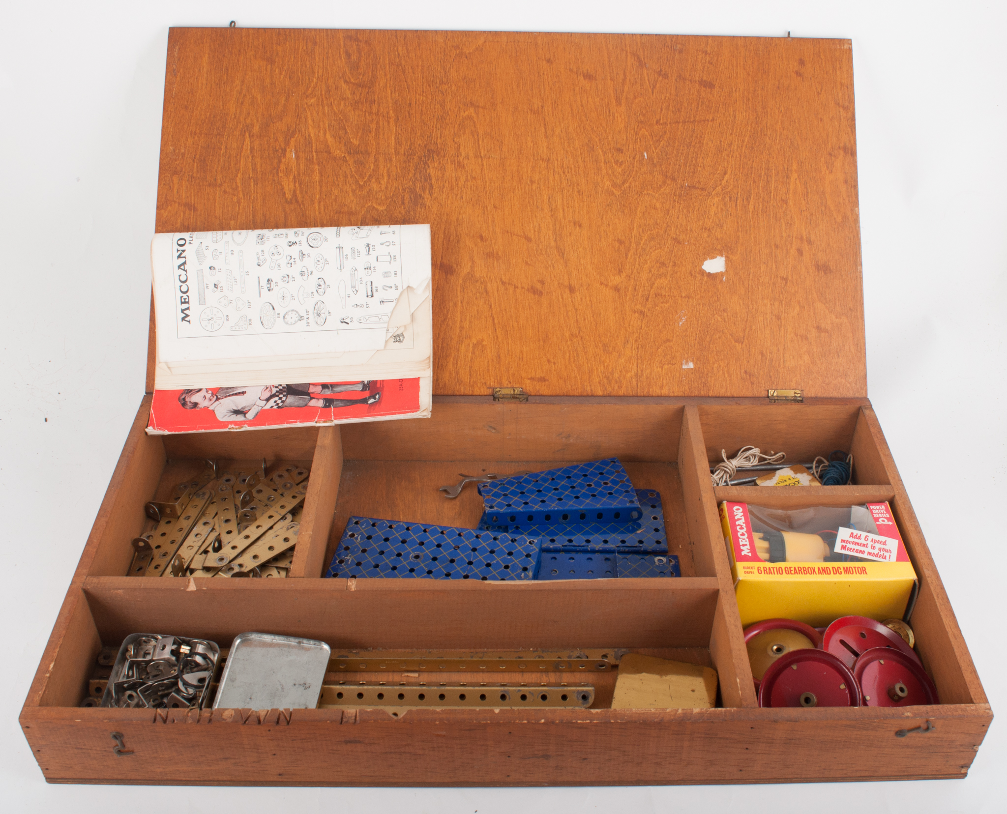 Meccano, selection of pre-war gold coloured girders, DC motor (boxed), other strips and rods,