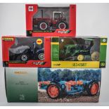 Ford Doe Triple diecast model tractor by Universal Hobbies, boxed, with other Britains tractors,