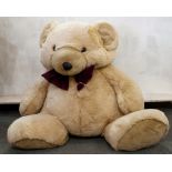 Large plush teddy bear, with bowtie, by Play by Play toys, about 80cm tall.
