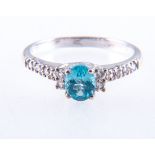 A turquoise apatite dress ring, the oval mixed cut stone, 6mm x 5mm,