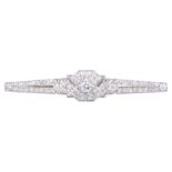 A diamond bar brooch in the Art Deco style,