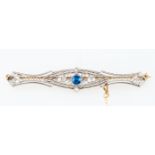 A sapphire and diamond bar brooch in the Art Deco style,