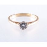 A diamond solitaire ring,