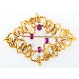 An 18 carat yellow gold modern brooch,