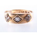 A diamond set gypsy ring,