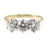 A diamond three stone ring, the brilliant cut stones,