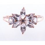 A pale pink morganite cluster ring, nine marquise,