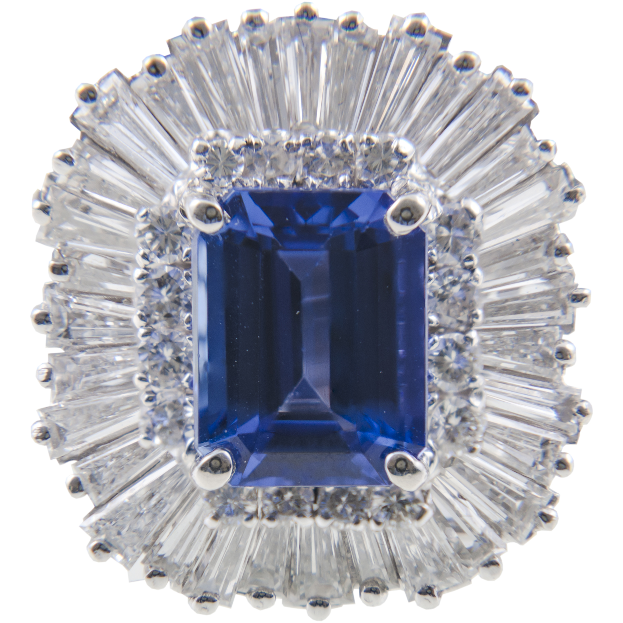 A tanzanite and diamond cluster ring/pendant, one rectangular emerald cut tanzanite, 10mm x 7.