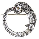 A yellow and white metal serpent brooch, the coiled serpent, 30mm diameter,