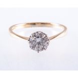 A diamond solitaire ring,