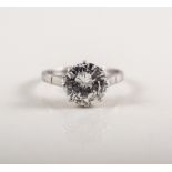 A diamond solitaire ring,