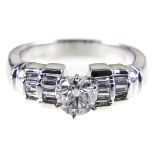 A diamond solitaire ring,