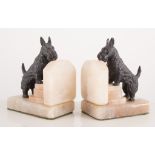 Pair of 'Terrier' dog bookends, alloy on alabaster plinths, and ten various books.