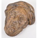 Medieval style carved wood face mask, 25cm.