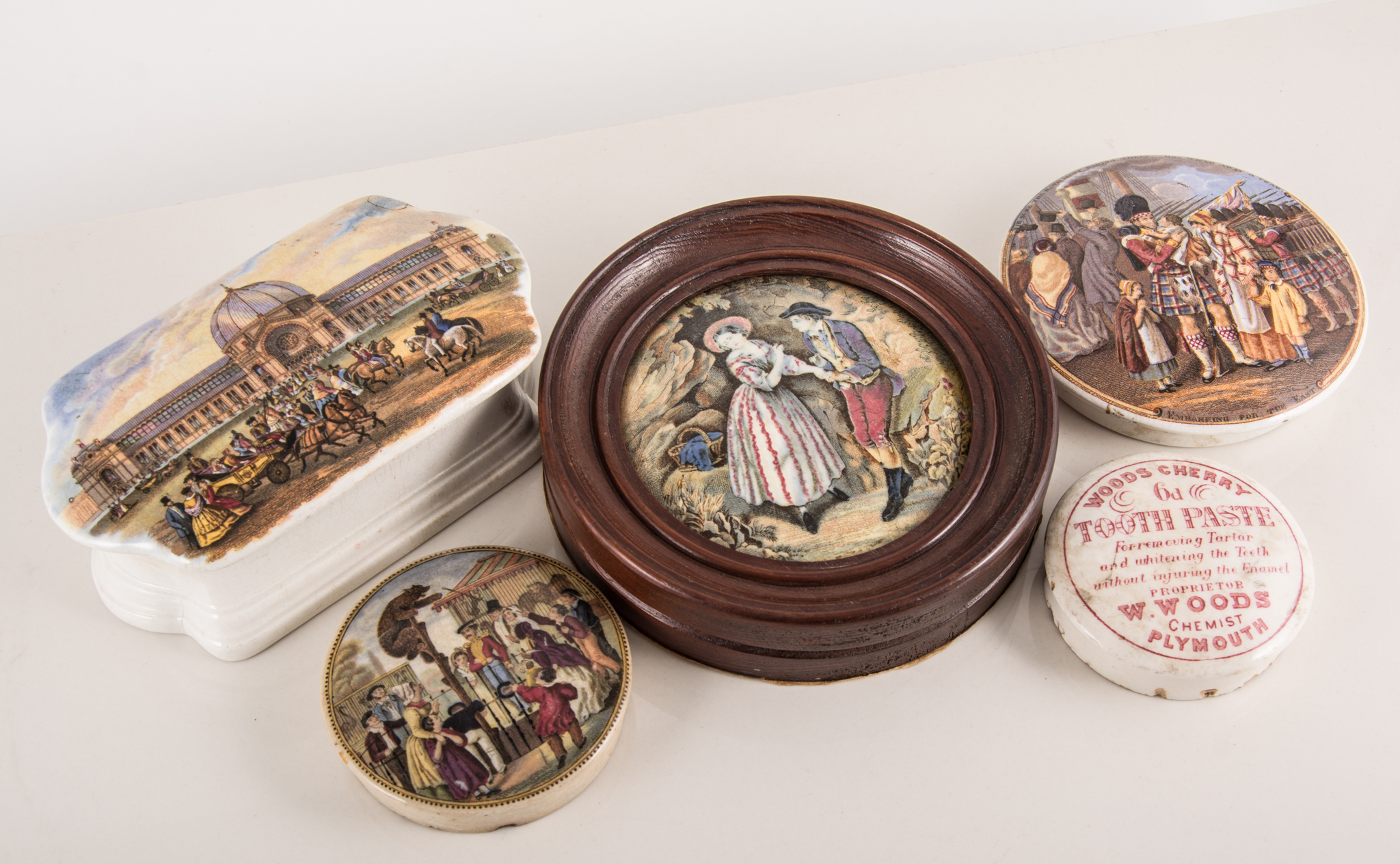 A collection of Prattware pot lids; twelve framed pot lids, other pot lids,