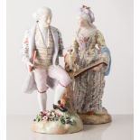 Pair of early 20th century German porcelain figures of musicians in 18th century costume,