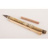 9ct gold pen barrel, yellow metal propelling pencil and a retractable pen,