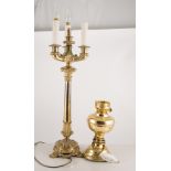 Pair of cast brass three light table lamps, 59cm, together with three brass paraffin lamps,