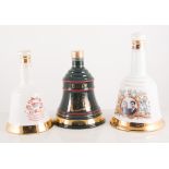 Eight Bells Whisky decanters, two small decanters and two bottles of beer,