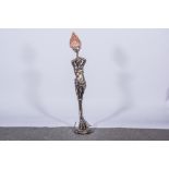 An unusual figural table lamp, early 20th century, patinated part metal, cast as a female satyr,