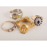A yellow metal dress ring, sapphire set, two other dress rings and two brooches.