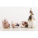 Four Royal Crown Derby paperweights and three Soviet animal models.