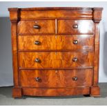 A Victorian Scottish mahogany chest of drawers, bow-front, with an ogee secret frieze drawer,