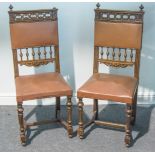 Six late Victorian oak framed dining chairs, pierced, carved and spindle backs,