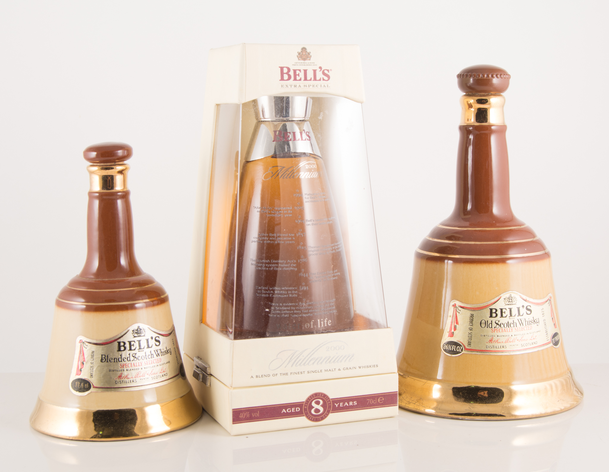 Eleven bottles of Bells Commemorative Whisky, (All Full).