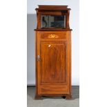 A late Victorian mahogany music cabinet, raised back with a shelf and a bevelled mirror panel,