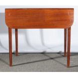 A late Georgian mahogany Pembroke table, rectangular top with rounded corners and two fall leaves,