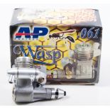 Two R/C glow engines, AP 061 WASP and MAGNUM 15GP,