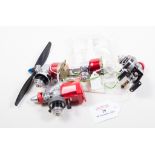 Four COX 049 glow engines,