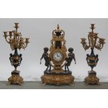 Gilt brass French clock garniture.