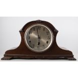 A mahogany cased eight-day mantle clock.