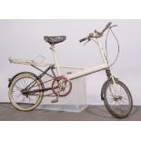 Vintage Moulton MkIII bicycle, white painted, another Moulton bicycle and a child's Moulton bicycle,