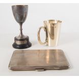 Silver cigarette case, drinks measure, small trophy on ebonised stand, (3).