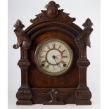 American walnut mantel clock.