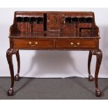 Reproduction mahogany desk, three quarter gallery top, fitted with three drawers and pigeon holes,