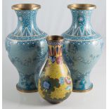 Pair of cloisonne vases, pale blue ground, baluster form, 23cm high; and a smaller cloisonne vase.