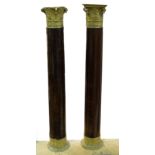 Two mahogany columns, with ormolu Corinthian mounts.