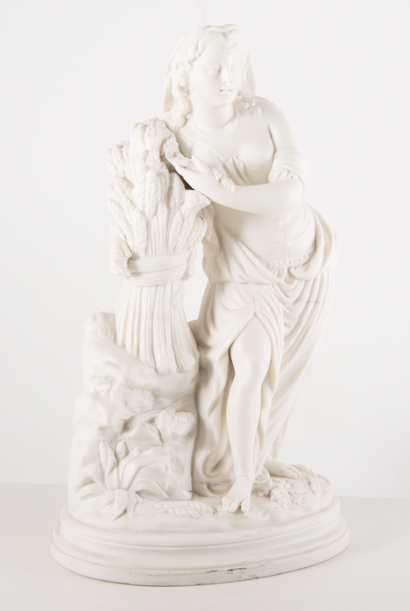 Victorian Parian figure, 'Harvest', overall plinth height 34cm, damaged.