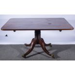 Regency mahogany rectangular tilt top pedestal dining table,
