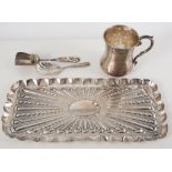 Victorian silver dressing table tray, London 1899, embossed gadrooned design, 24cm; silver mug,