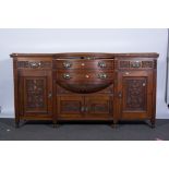 Victorian walnut bow front sideboard, with carved drawers and cupboards, W182cm x D48cm x H95cm.