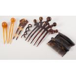 Collection of tortoiseshell and amber coloured hair combs, (17).