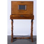 Walnut marquetry vanity table, the top inlaid with foliate panel,